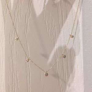 The M Jewelers dangle choker necklace, worn twice